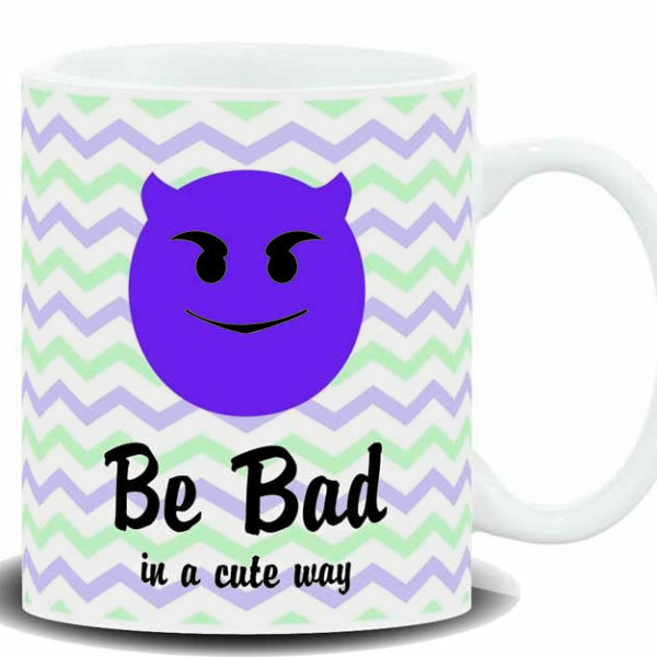 MUG CON MENSAJE EMOTICON,BE BAD.... SIMPATICO....